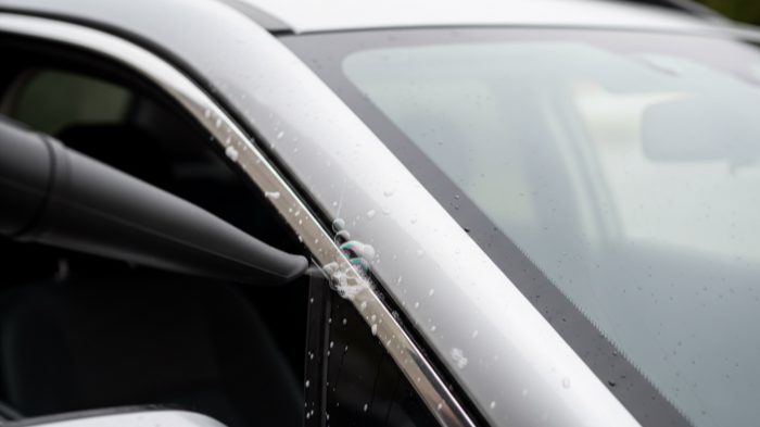 Has anyone solved a post-repair wind-noise issue that the shop kept calling "normal"?