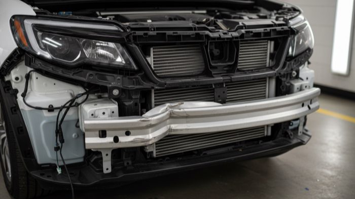 My insurer denied OEM crash bar replacement on a major front-end job – worth escalating or not?